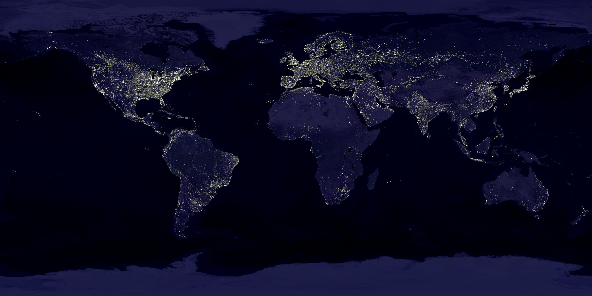Mappa notturna del mondo con le città come gruppi luminosi connessi